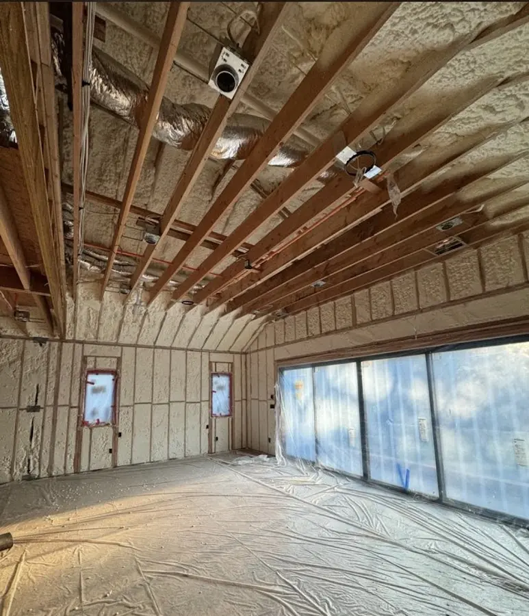 Interior walls and ceiling insulated with spray foam during new construction in Imperial Beach